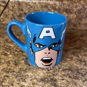 Blue Ceramic Superhero Mug with Expressive Design